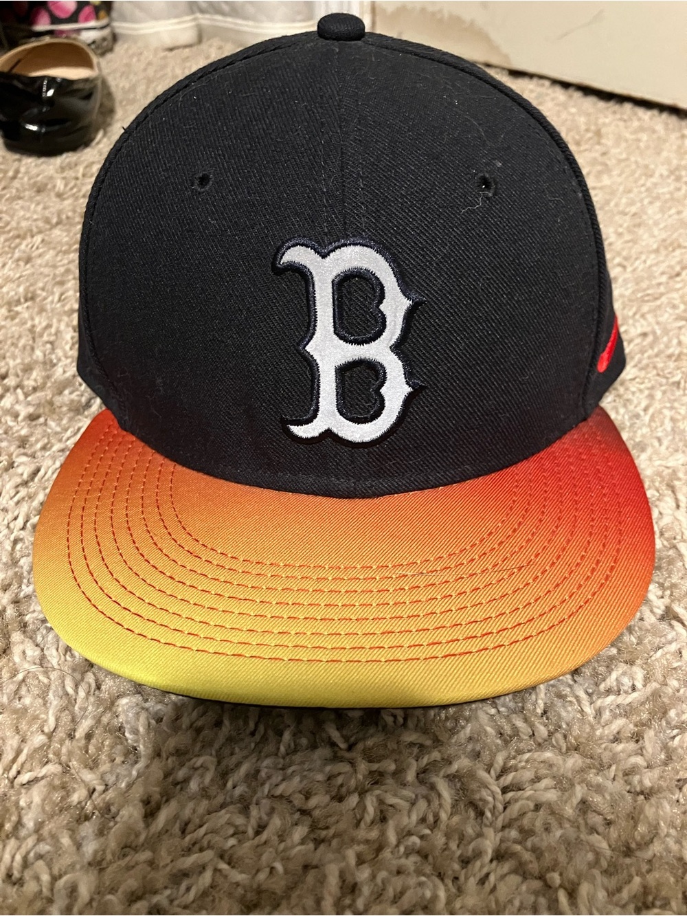 Nike Black Baseball Cap with Orange-to-Yellow Gradient Brim